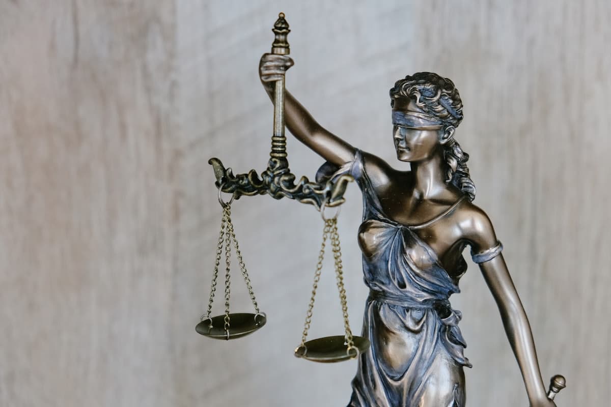 Scales of justice on a law office desk